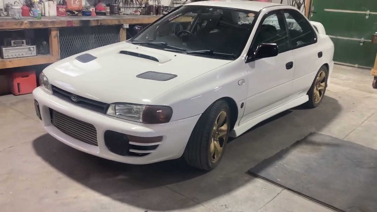 1995 Subaru Impreza in white after a full repaint, Jack's Custom Restoration Telkwa BC