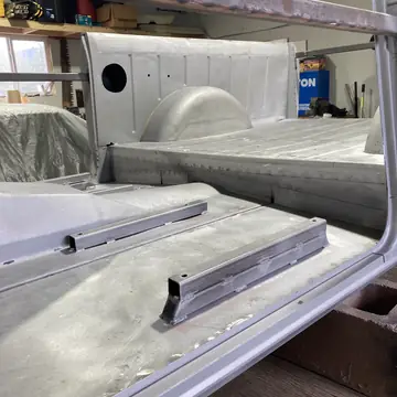 Bed floor and front panel blasted bare in the shop