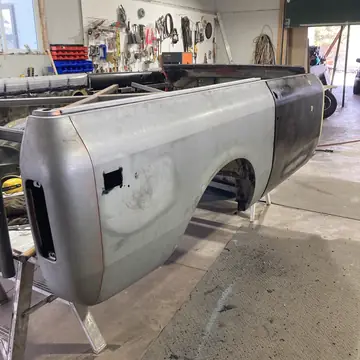 Truck bedside with new lower patch panels welded in