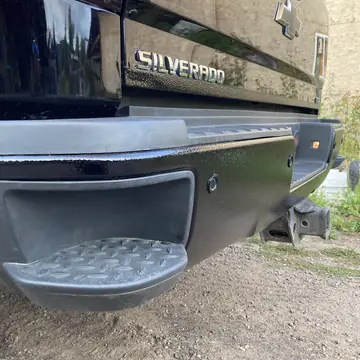 Silverado rear bumper and step coated in liner